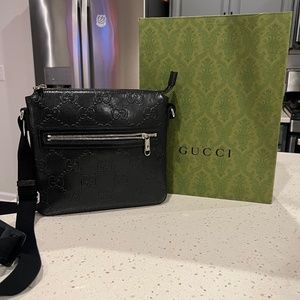 Embossed Gucci Messenger Bag